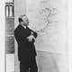 André Citroën studying a map of the expedition’s itinerary.